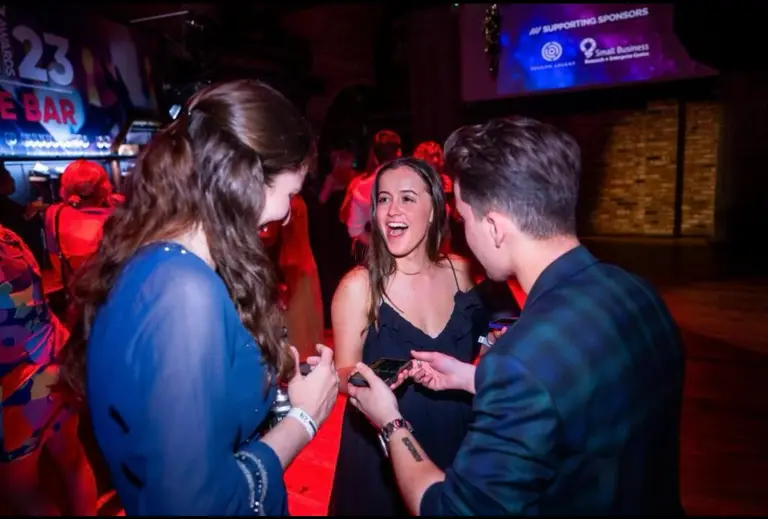 Guests reacting to Charlie Hewish's close-up magic