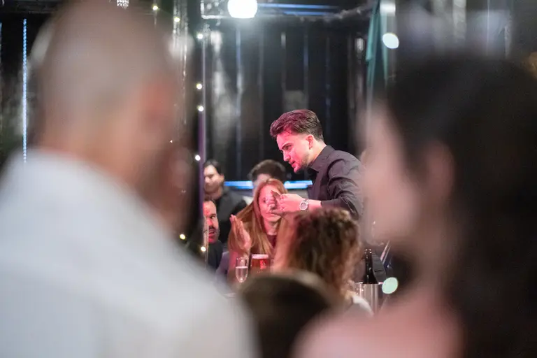 Charlie Hewish performing on stage