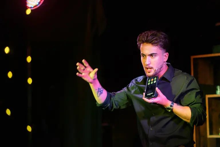 Charlie Hewish performing on stage